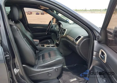 2014 Jeep Grand Cherokee Overland z USA, uszkodzony, nr VIN 1C4RJECTXEC213650